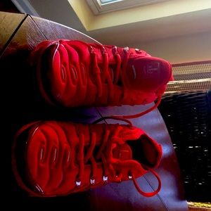 Red Nike Air tennis shoes